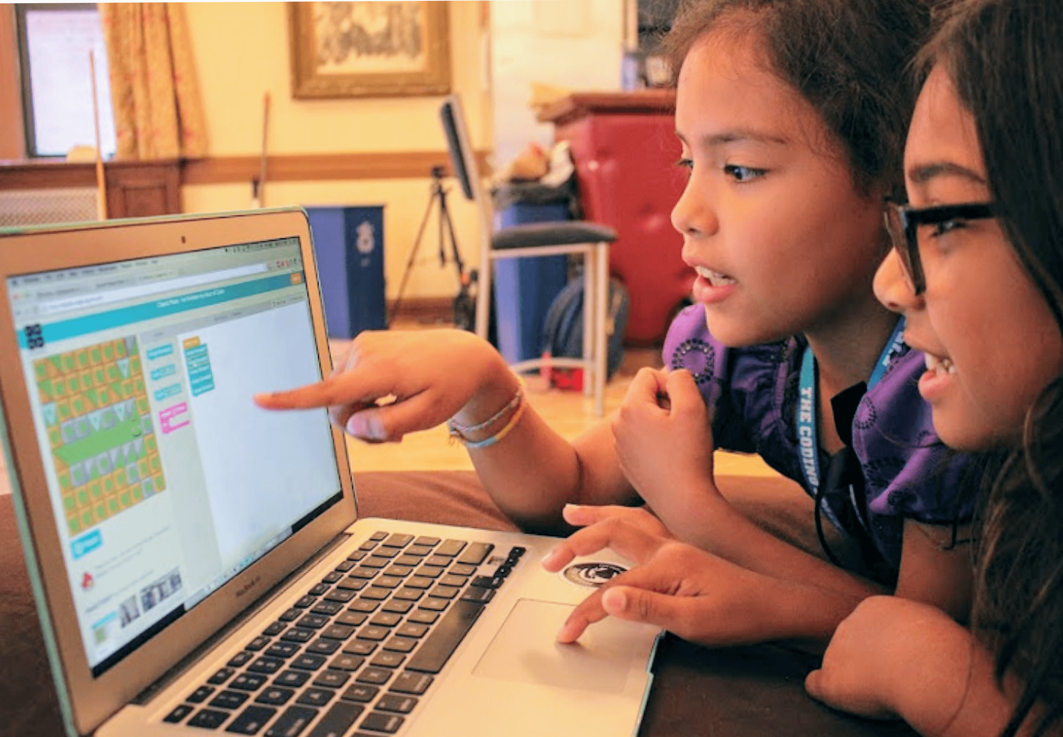 Group of two students coding.