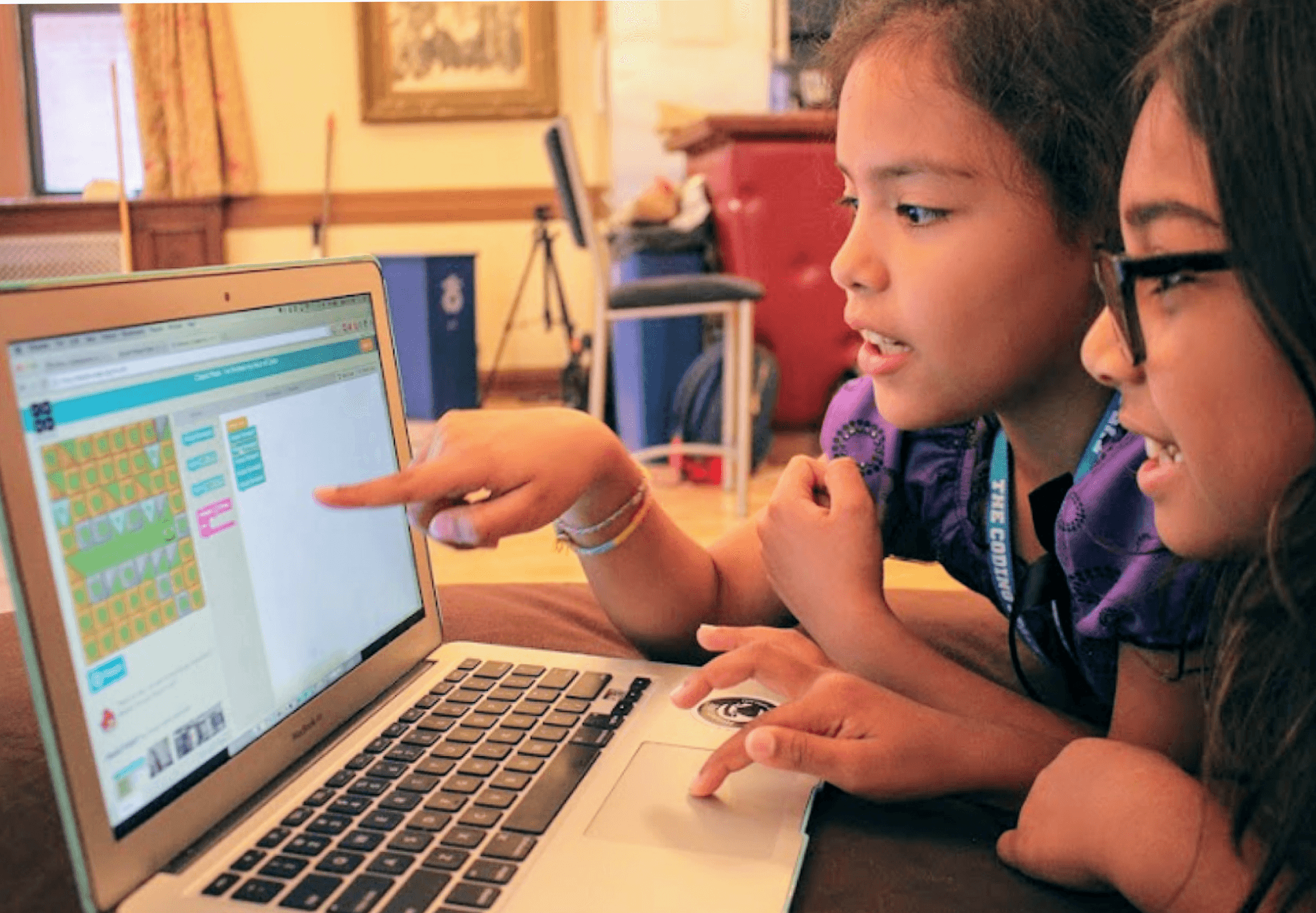 Two girls working on a Scratch program